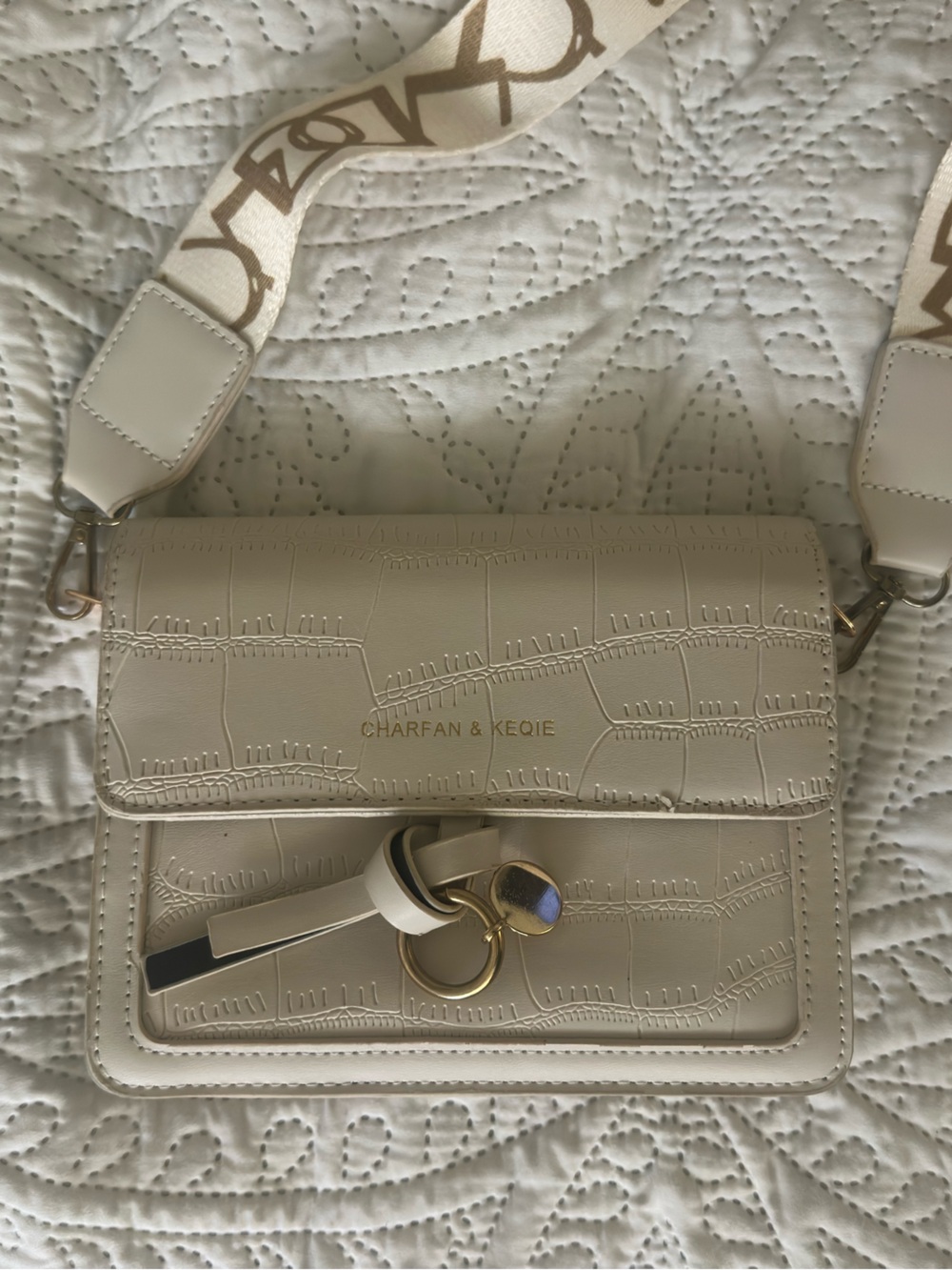 Beige Croc-Embossed Crossbody Bag with Signature Strap